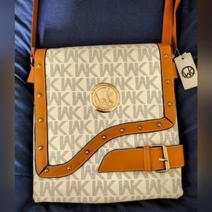 Logo style crossbody bag.  Tan and brown